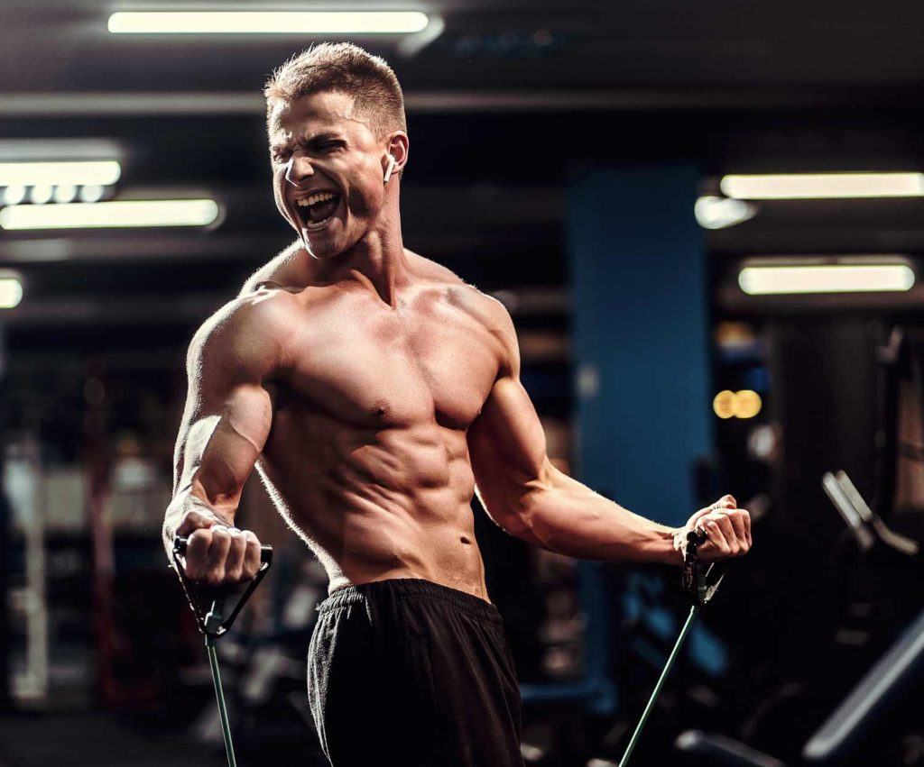Bodybuilder working out in a gym