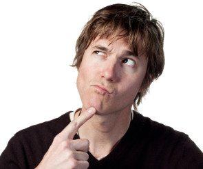 Man touching his chin thinking